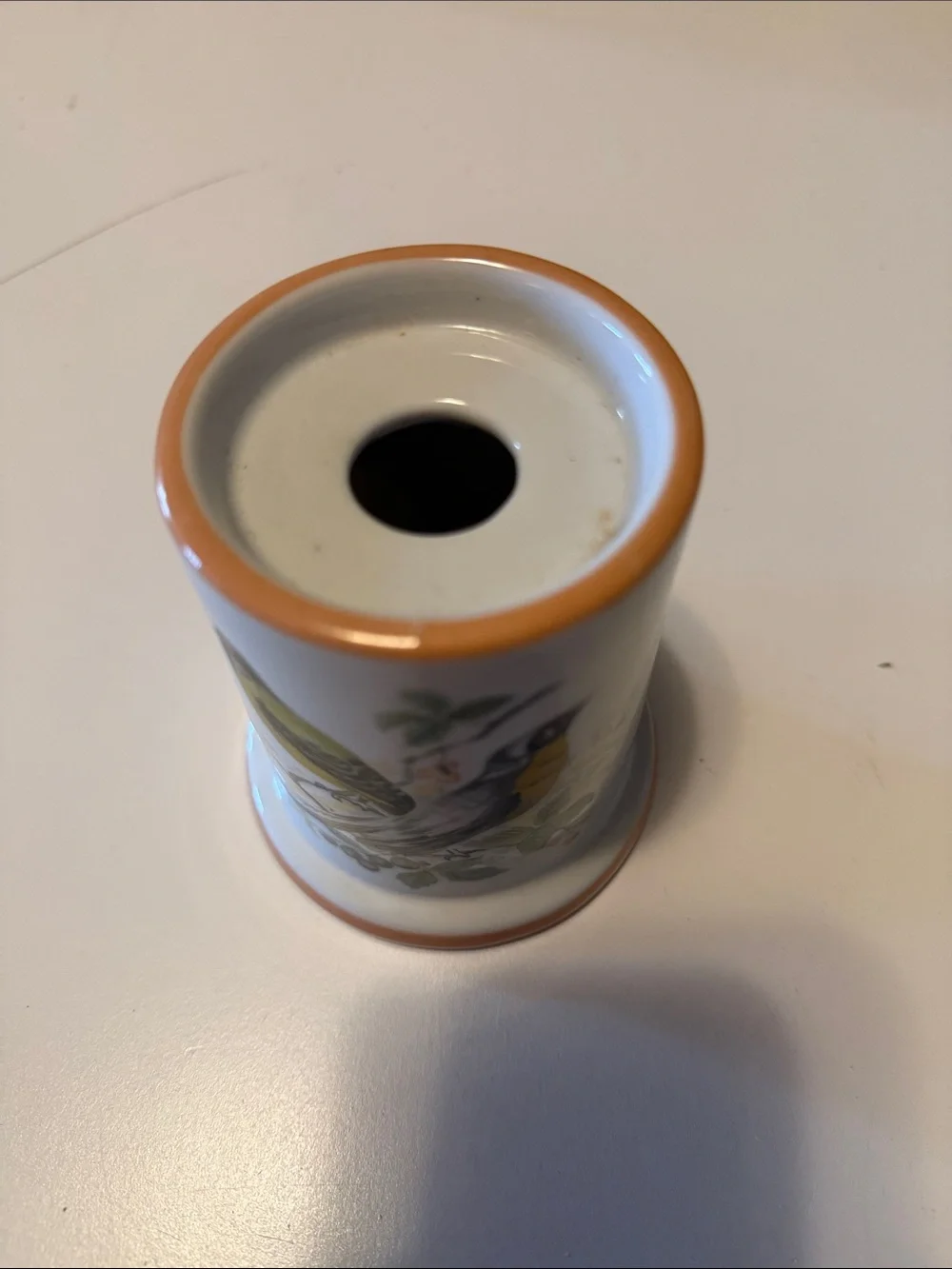 Vintage ceramic candleholder with yellow finch on both sides.  Good condition.